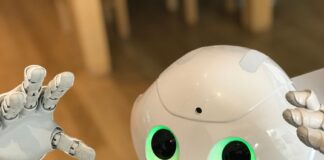 Humanoidalny robot z zielonymi oczami w nowoczesnym, futurystycznym otoczeniu